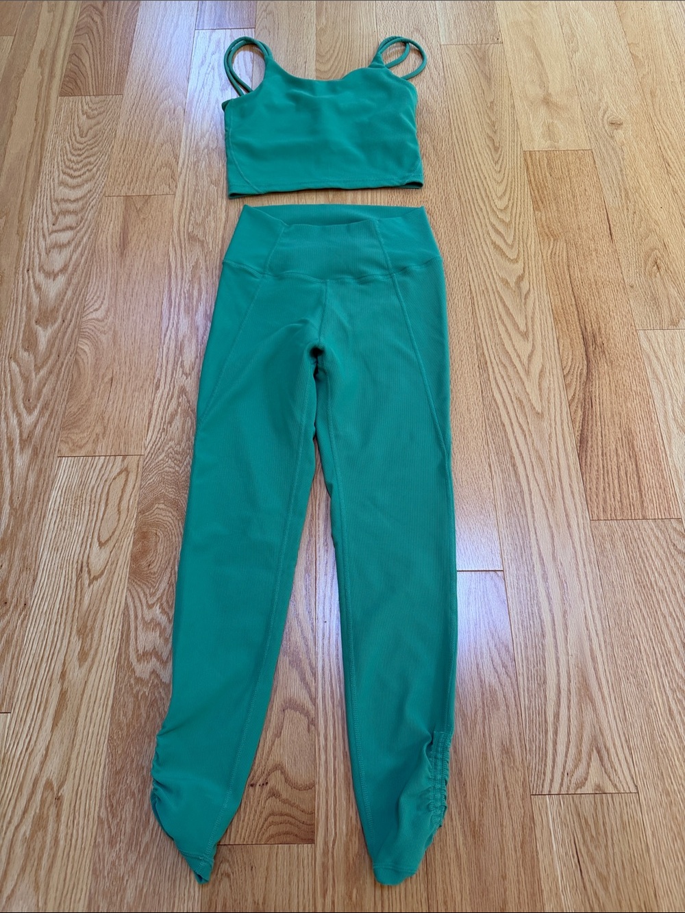 Wilo the label small ruched ankle base ribbed leggings and tank set in green.